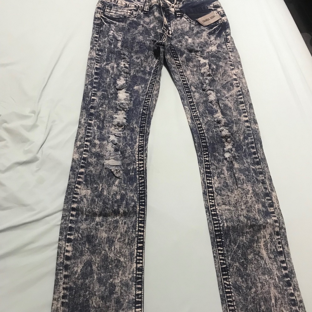 Puzzle Ripped Blue Jeans from Hot Topic